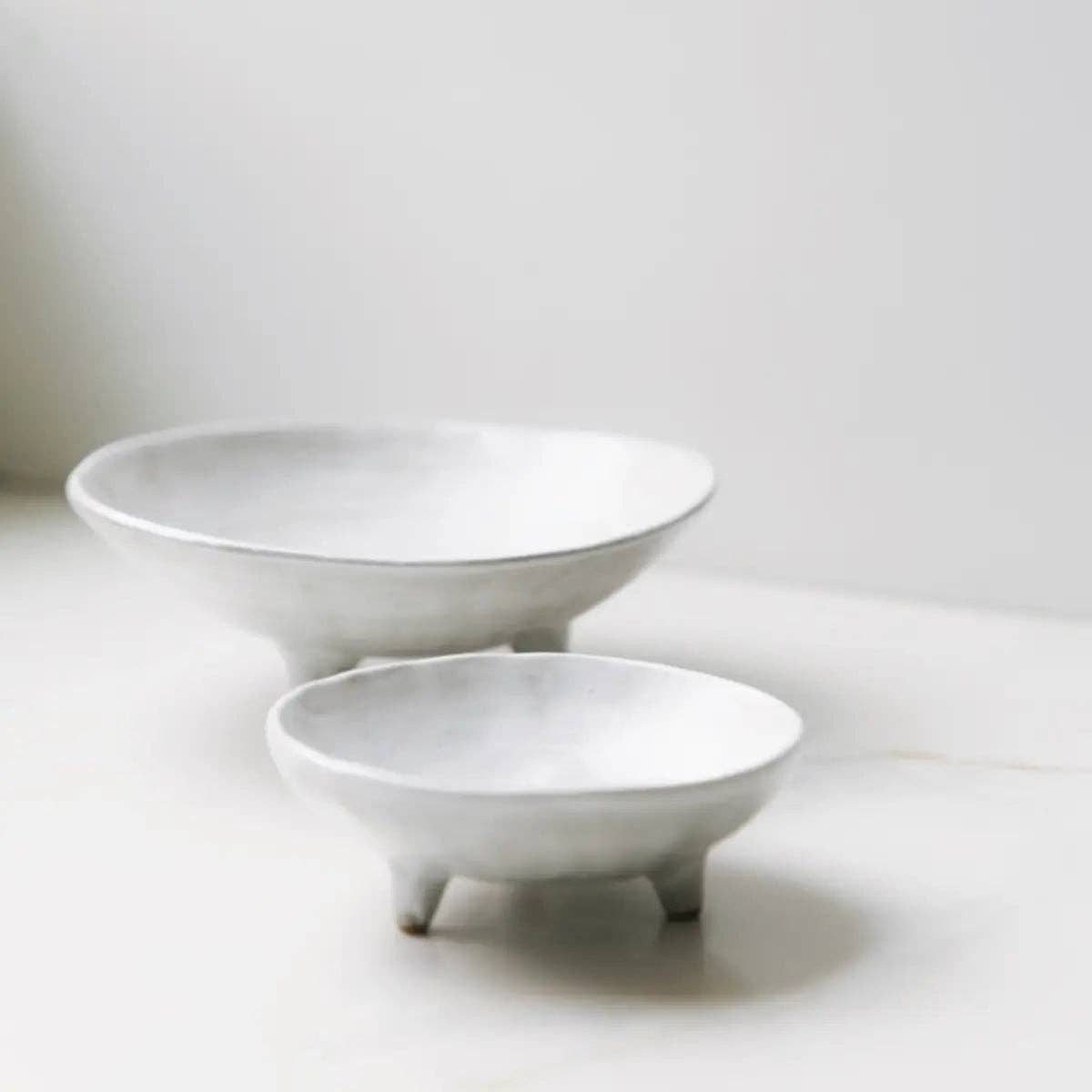 footed ceramic display bowl