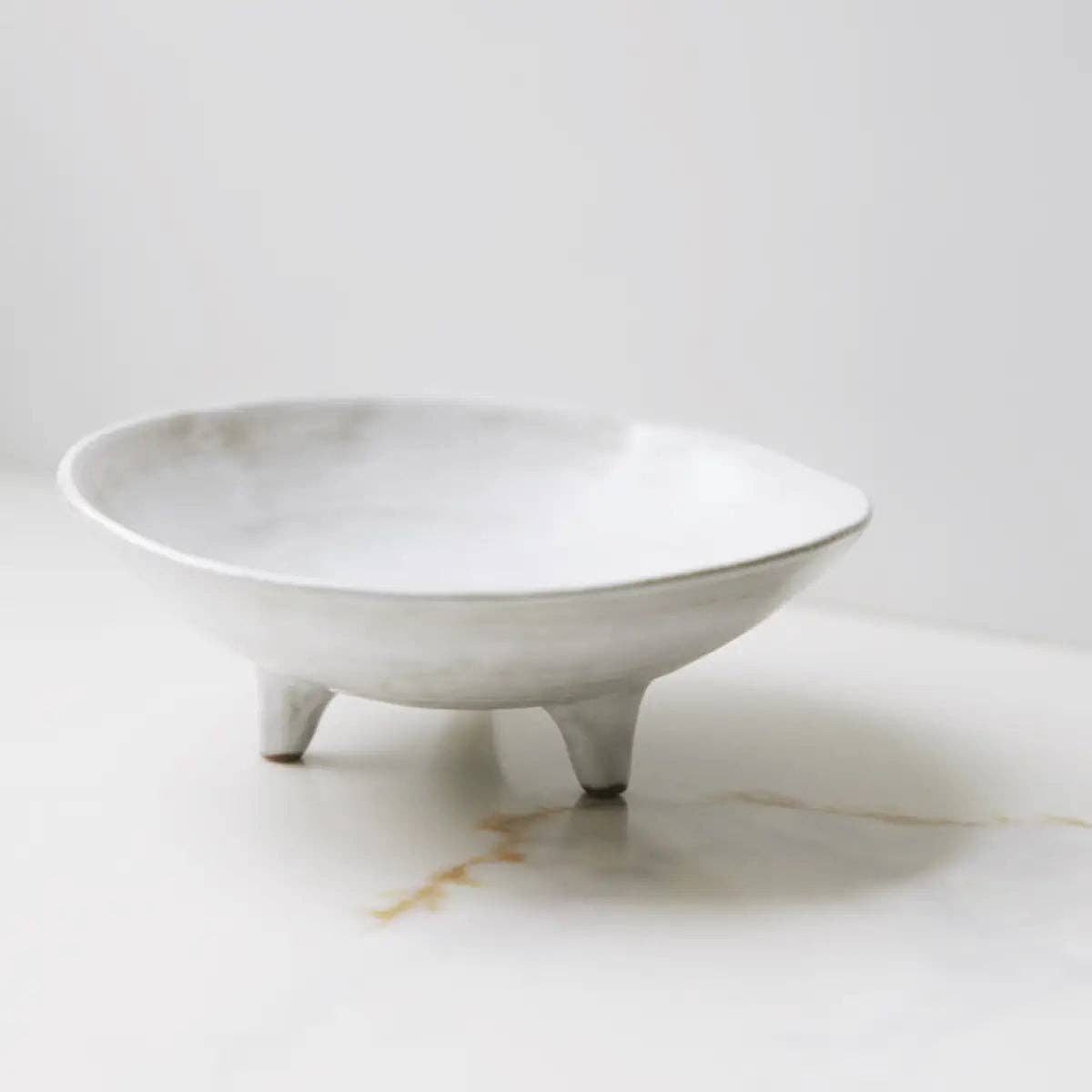 footed ceramic display bowl