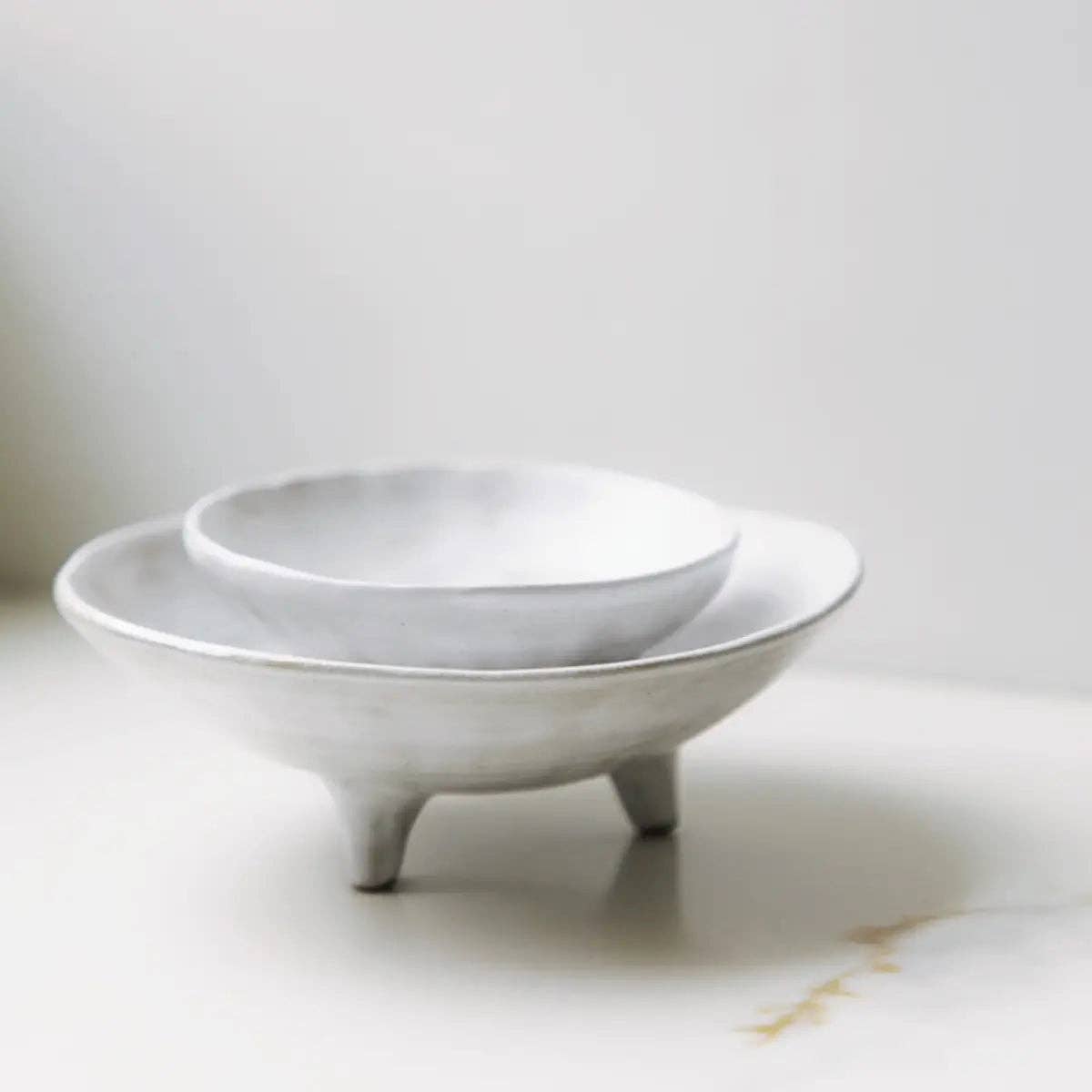 footed ceramic display bowl