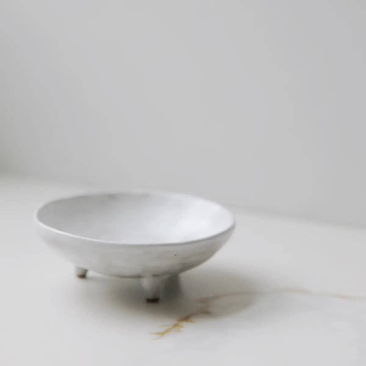 footed ceramic display bowl